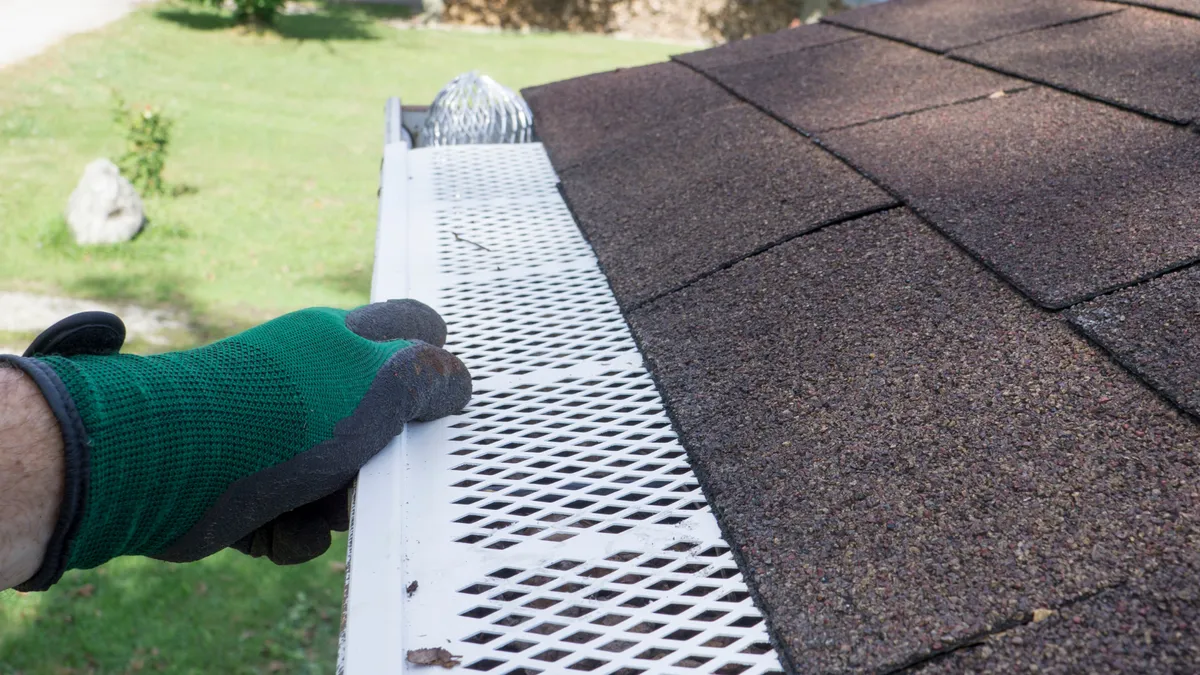 Gutter guard system protecting a Carmel home from leaf debris