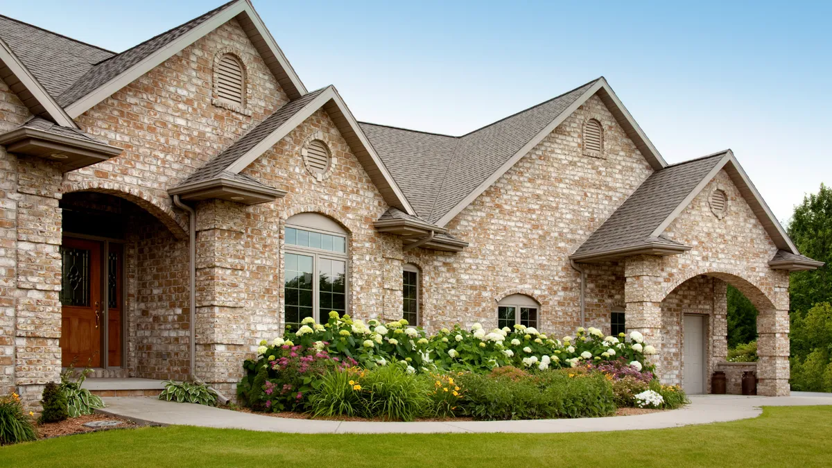 Upscale Carmel home with professional gutters
